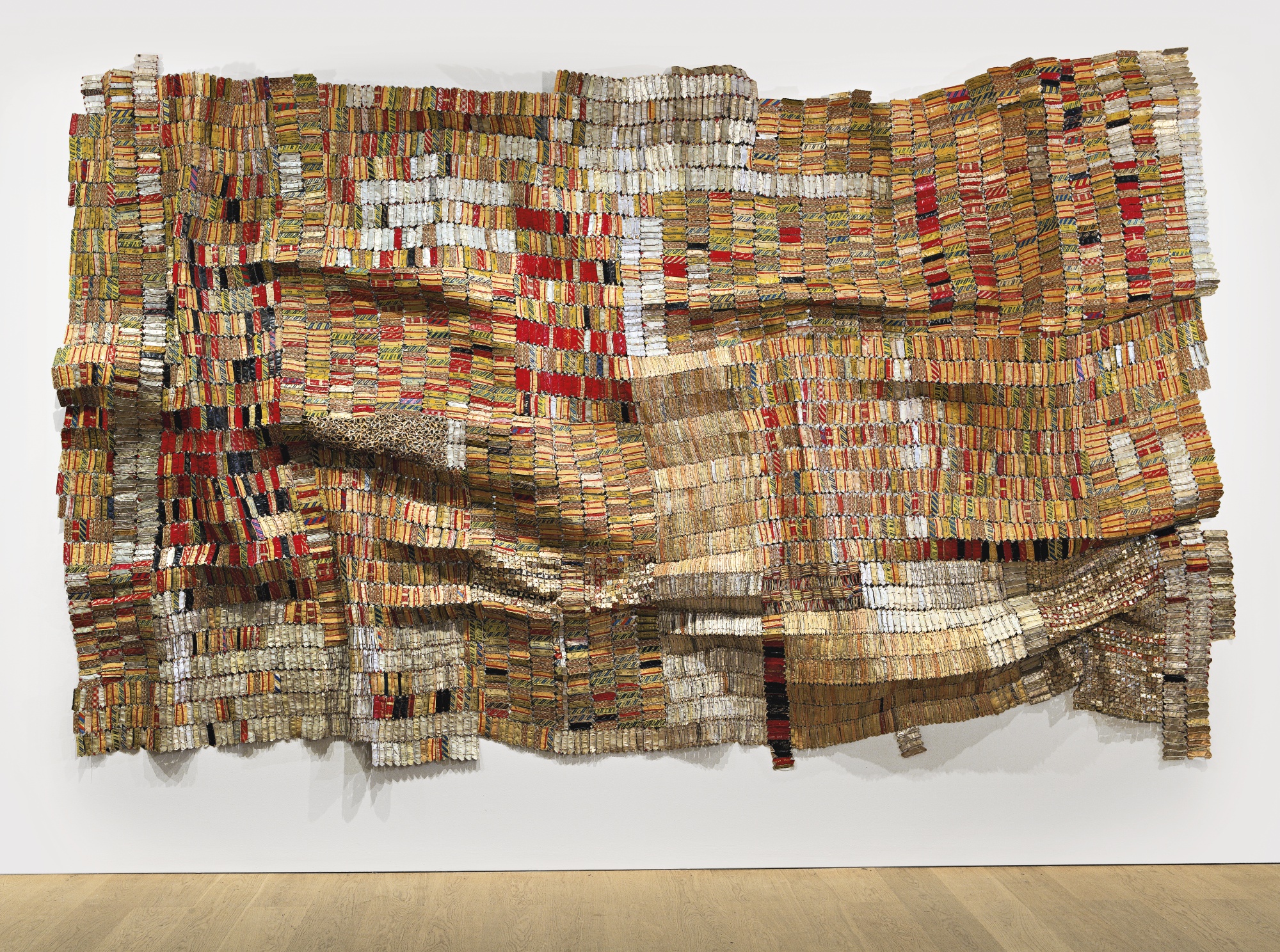 A sophisticated gallery setting showcasing contemporary African artworks for sale to global collectors.